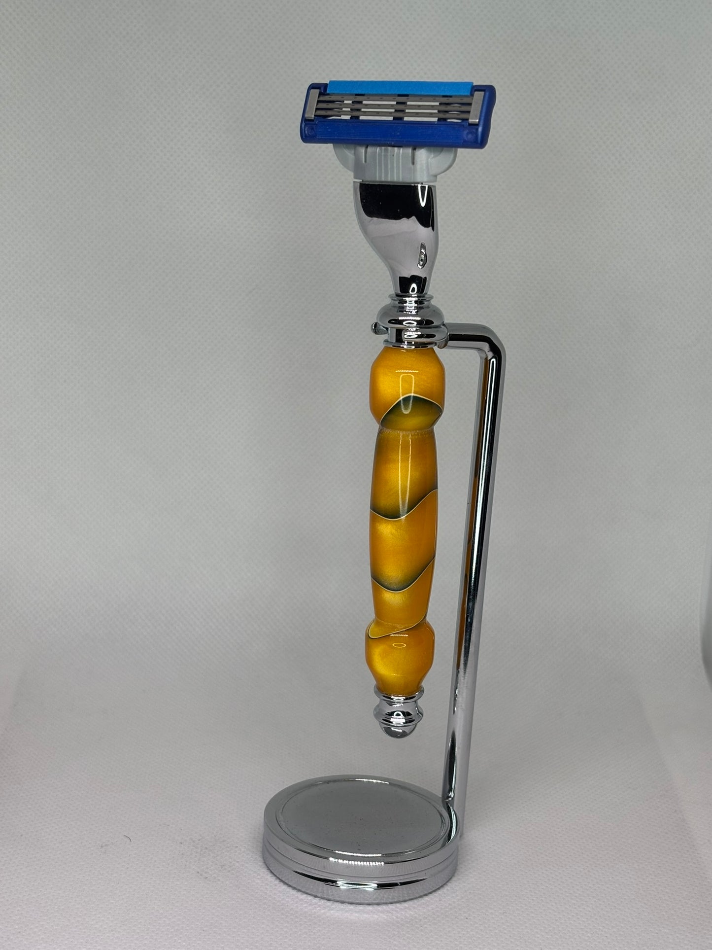 Hand-Carved Razor with Chrome Stand
