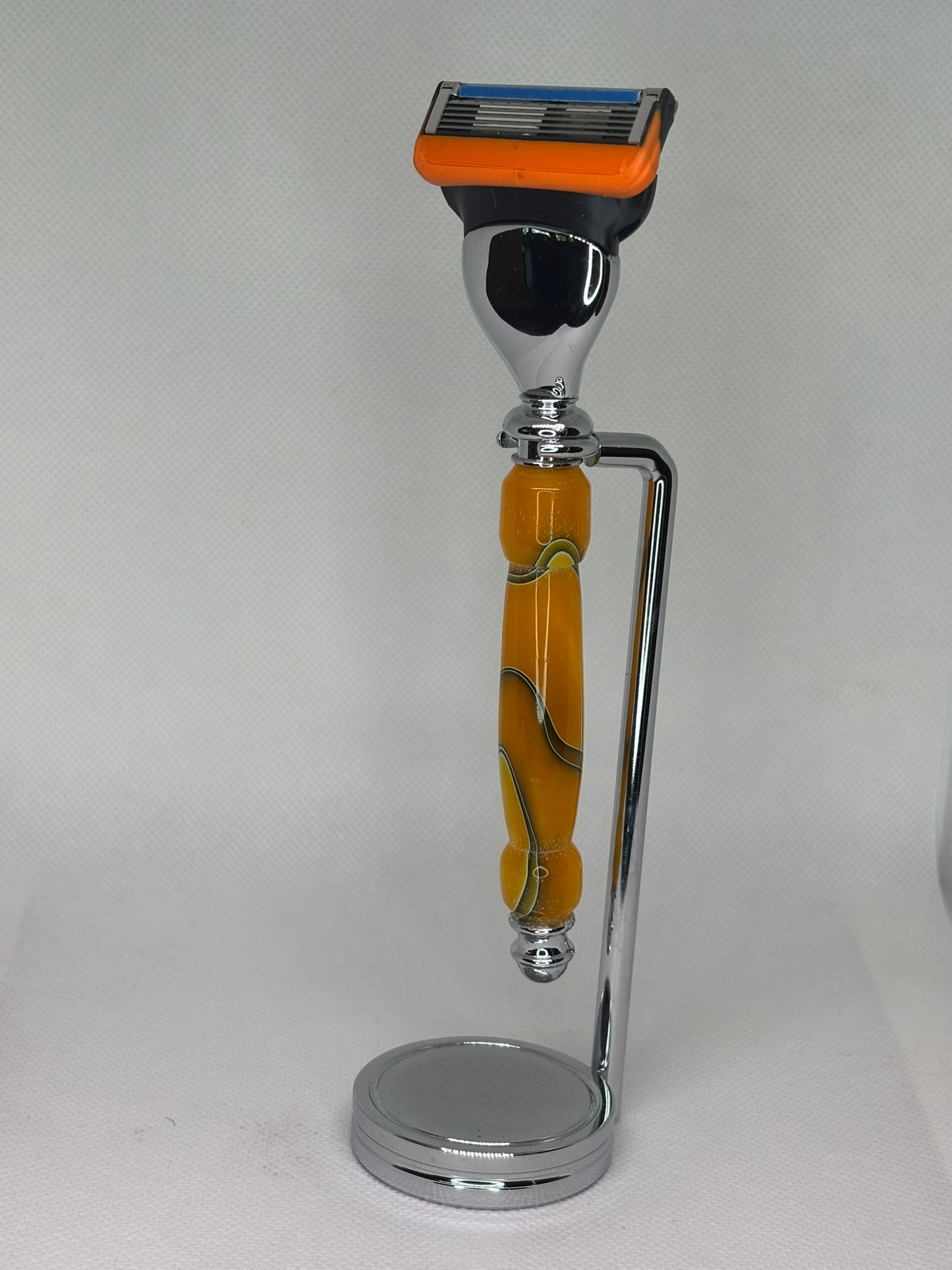 Hand-Carved Razor with Chrome Stand